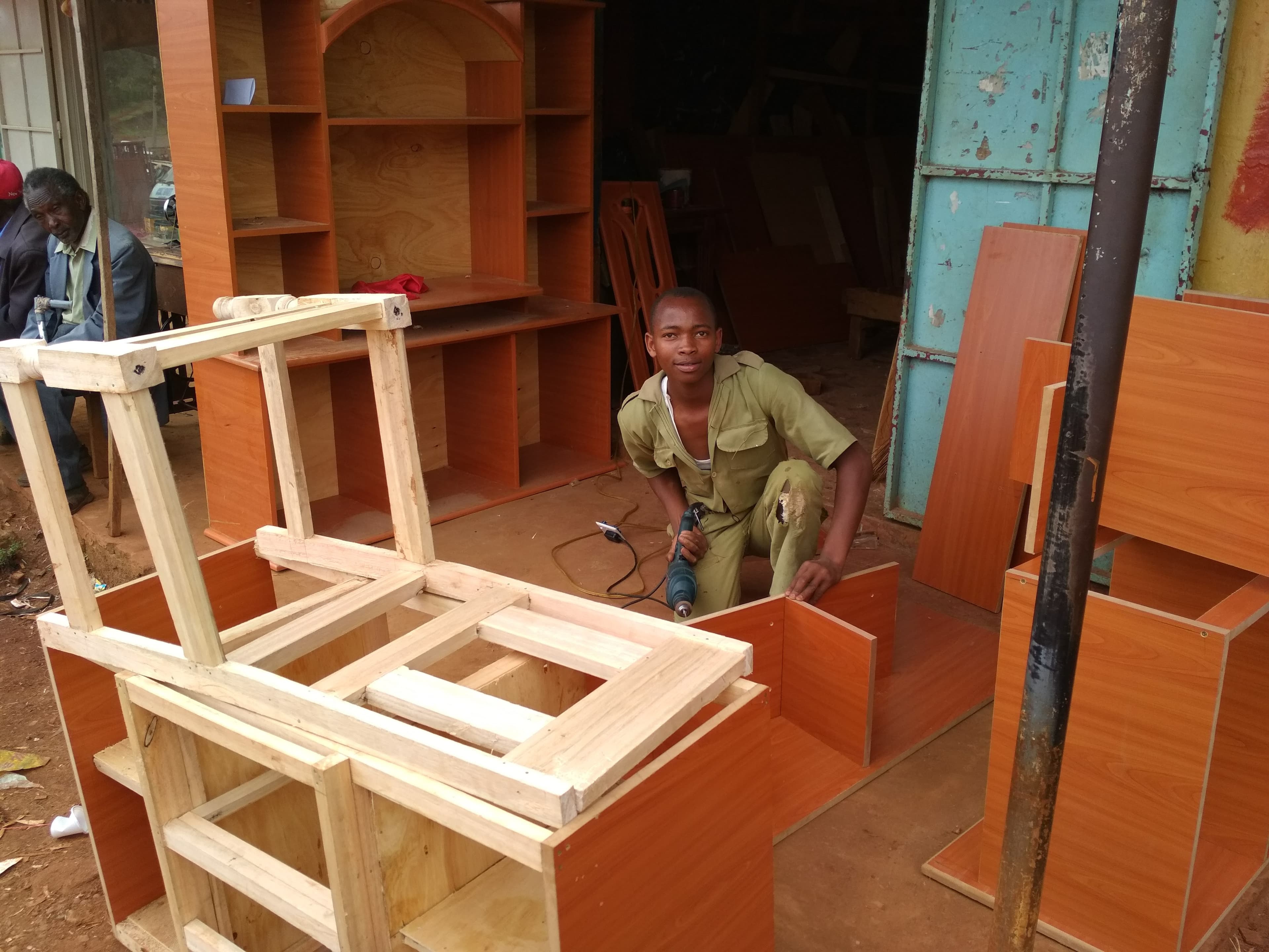 Representative young Kenyan working in carpentry, illustrating a practical skills-to-work pathway