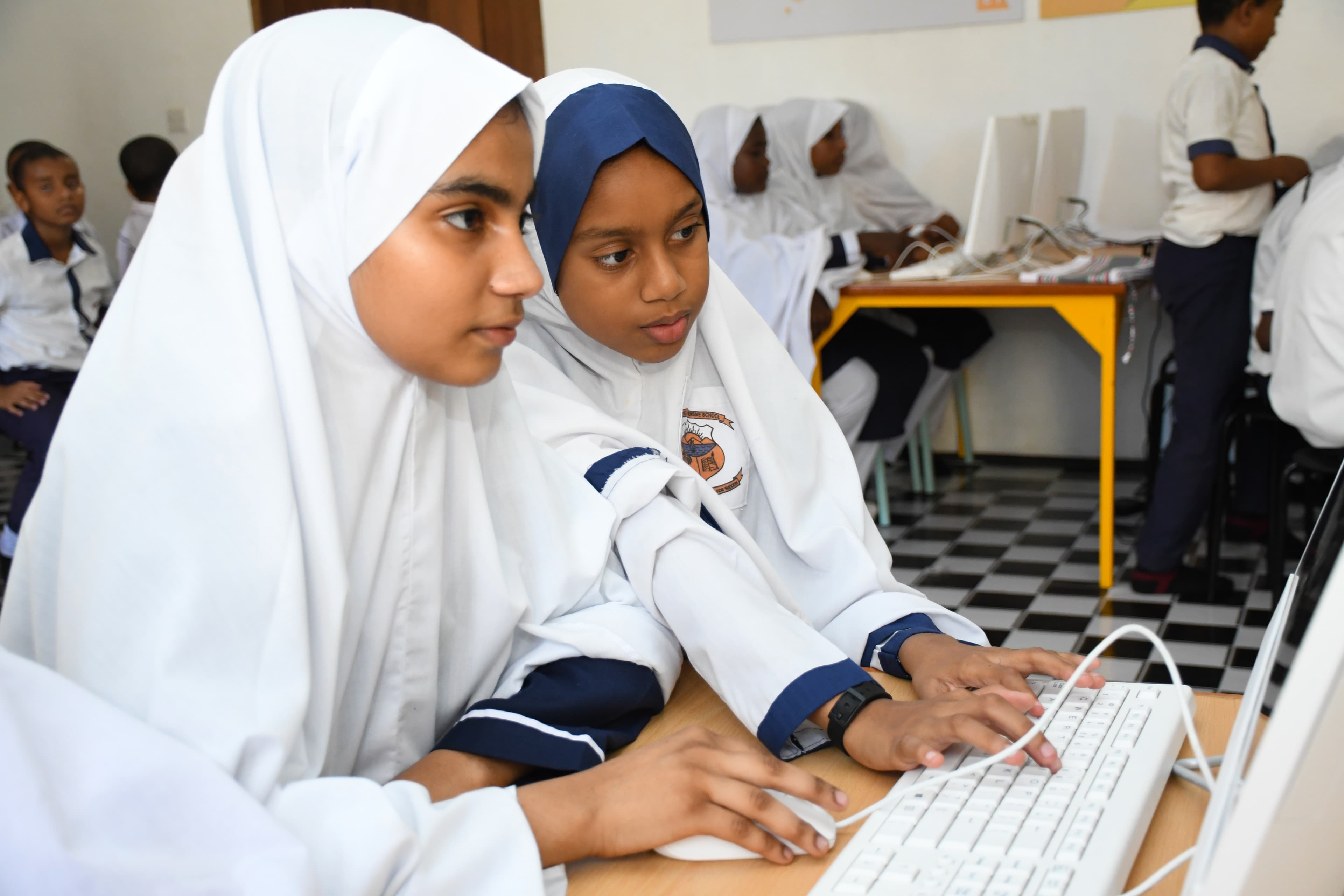 Representative image of girls using a computer in Kenya